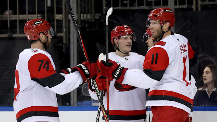 Feb 5, 2026; New York, New York, USA; Carolina Hurricanes center Jordan Staal (11) celebrates his empty net goal against the New York Rangers with teammates during the third period at Madison Square Garden. Mandatory Credit: Brad Penner-Imagn Images