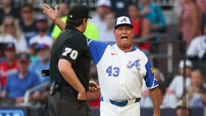 Aug 24, 2024; Atlanta, Georgia, USA; Atlanta Braves manager Brian Snitker (43) argues with umpires against the Washington Nationals in the second inning at Truist Park. Mandatory Credit: Brett Davis-Imagn Images

