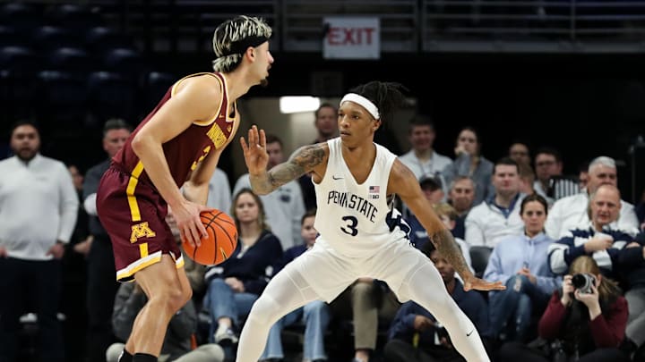 Feb 4, 2025; University Park, Pennsylvania, USA; Penn State Nittany Lions guard Nick Kern Jr (3) defends as Minnesota Golden Gophers forward Dawson Garcia (3) holds the ball during the first half at Bryce Jordan Center. Mandatory Credit: Matthew O'Haren-Imagn Images