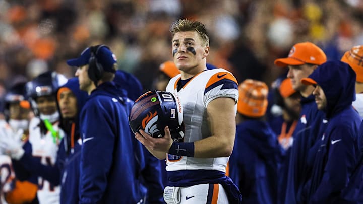 Dec 28, 2024; Cincinnati, Ohio, USA; Denver Broncos quarterback Bo Nix (10) stands on the sidelines during the second half against the Cincinnati Bengals at Paycor Stadium. Mandatory Credit: Katie Stratman-Imagn Images