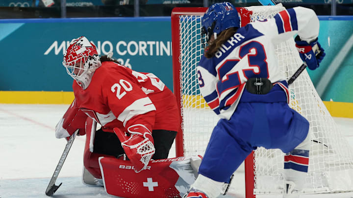 [US, Mexico & Canada customers only] Feb 8, 2026; Milan, Italy; Hannah Bilka of United States in action with Andrea Braendli of Switzerland in women's ice hockey group A play during the Milano Cortina 2026 Olympic Winter Games at Milano Santagiulia Ice Hockey Arena. Mandatory Credit: Mike Segar/Reuters via Imagn Images