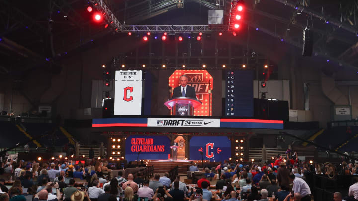 Jul 14, 2024; Ft. Worth, TX, USA; MLB Commissioner Rob Manfred announces Minnesota Twins draft pick Travis Bazzana as the first pick during the first round of the MLB Draft at Cowtown Coliseum. Mandatory Credit: Kevin Jairaj-USA TODAY Sports Jul 14, 2024; Ft. Worth, TX, USA; MLB Commissioner Rob Manfred announces Minnesota Twins draft pick Travis Bazzana as the first pick during the first round of the MLB Draft at Cowtown Coliseum. Mandatory Credit: Kevin Jairaj-USA TODAY Sports