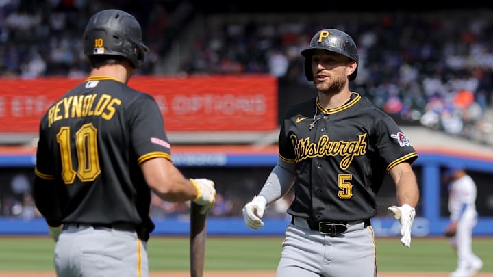 Mar 26, 2026; New York City, New York, USA; Pittsburgh Pirates second baseman Brandon Lowe (5) celebrates his solo home run against the New York Mets with left fielder Bryan Reynolds (10) during the third inning at Citi Field. Mandatory Credit: Brad Penner-Imagn Images