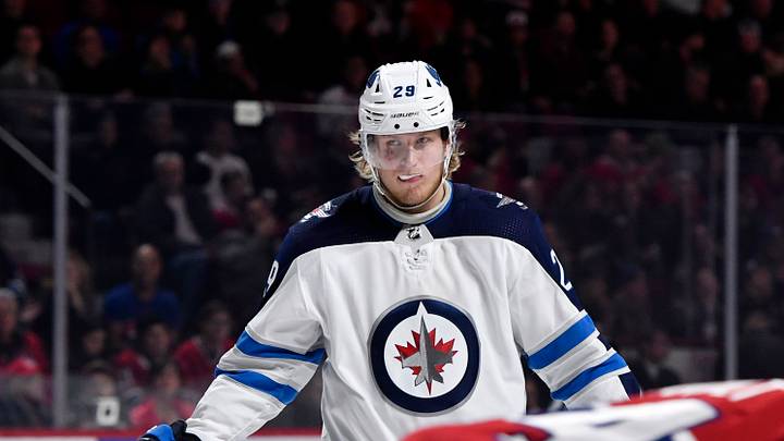 Winnipeg Jets forward Patrick Laine prepares for a face off against the Montreal Canadiens during the third period at the Bell Centre. Mandatory Credit: Eric Bolte-USA TODAY Sports Winnipeg Jets forward Patrick Laine prepares for a face off against the Montreal Canadiens during the third period at the Bell Centre. Mandatory Credit: Eric Bolte-USA TODAY Sports