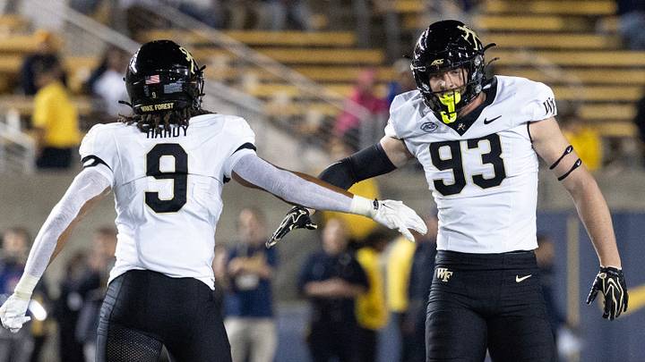 Oct 17, 2026; Berkeley, California, USA; Wake Forest Demon Deacons defensive linemen Camden Hardy (9) and Cade Holles (93) celebrate stopping the California Golden Bears on downs during the fourth quarter at California Memorial Stadium. Mandatory Credit: D. Ross Cameron-Imagn Images Oct 17, 2026; Berkeley, California, USA; Wake Forest Demon Deacons defensive linemen Camden Hardy (9) and Cade Holles (93) celebrate stopping the California Golden Bears on downs during the fourth quarter at California Memorial Stadium. Mandatory Credit: D. Ross Cameron-Imagn Images