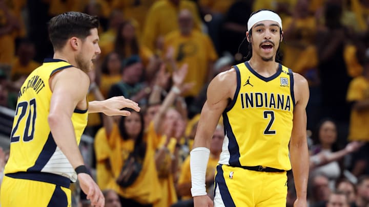 May 25, 2024; Indianapolis, Indiana, USA; Indiana Pacers guard Andrew Nembhard (2) celebrates with forward Doug McDermott (20) after making a basket against the Boston Celtics during the second quarter of game three of the eastern conference finals in the 2024 NBA playoffs at Gainbridge Fieldhouse. Mandatory Credit: Trevor Ruszkowski-USA TODAY Sports