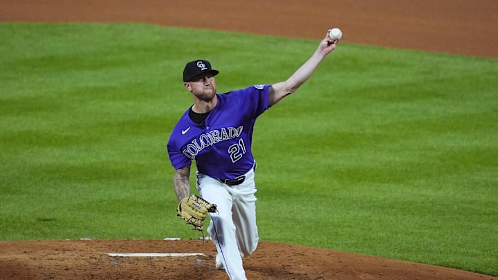 Apr 7, 2026; Denver, Colorado, USA; Colorado Rockies starting pitcher Kyle Freeland (21) delivers a pitch in the third inning against the Houston Astros at Coors Field. 