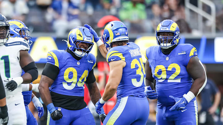 Jan 5, 2025; Inglewood, California, USA; Los Angeles Rams defensive end Desjuan Johnson (94) celebrates a sack versus Seattle Seahawks Quarterback Geno Smith (7) at SoFi Stadium. Mandatory Credit: William Navarro-Imagn Images Jan 5, 2025; Inglewood, California, USA; Los Angeles Rams defensive end Desjuan Johnson (94) celebrates a sack versus Seattle Seahawks Quarterback Geno Smith (7) at SoFi Stadium. Mandatory Credit: William Navarro-Imagn Images
