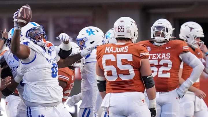 Kentucky Wildcats defensive tackle Deone Walker (0) celebrates a fumble recovery against Texas Longhorns in the third quarter during the second half of an NCAA college football game at Darrell K Royal Texas Memorial Stadium, Austin, Texas, Saturday, Nov 24, 2024.