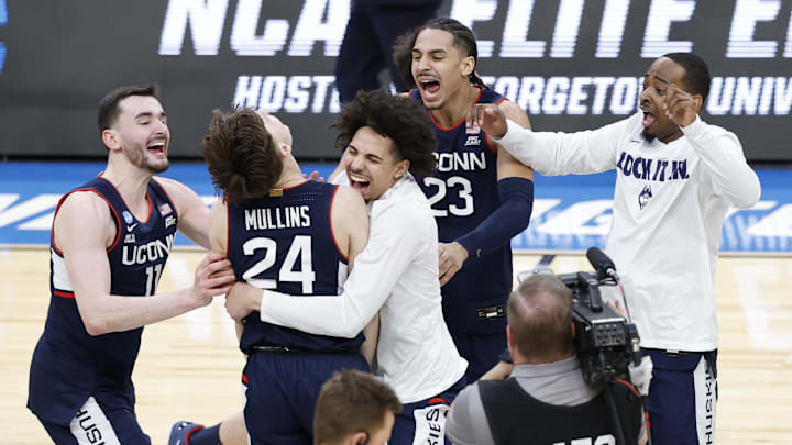 UConn Huskies forward Alex Karaban (11) celebrates with UConn Huskies guard Braylon Mullins (24)