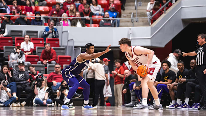 Wesley Yates III, on defense here, had 15 first-half points at WSU.