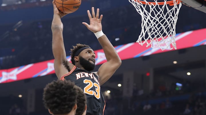 Dec 31, 2021; Oklahoma City, Oklahoma, USA; New York Knicks center Mitchell Robinson (23) goes up for a basket against the Oklahoma City Thunder during the first quarter at Paycom Center. Mandatory Credit: Alonzo Adams-Imagn Images