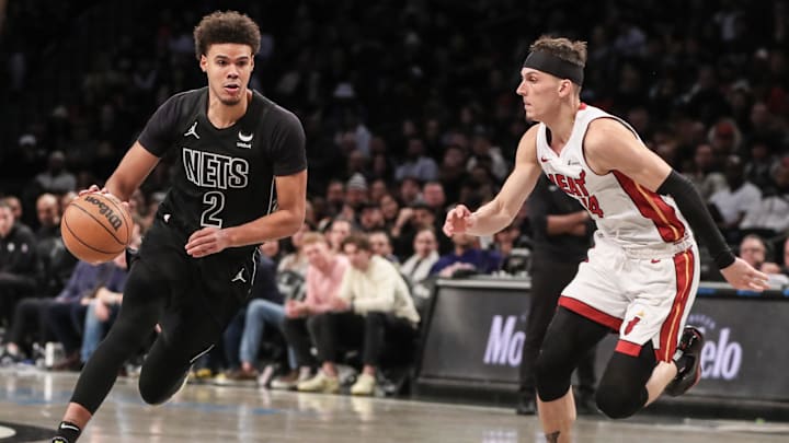 Jan 15, 2024; Brooklyn, New York, USA; Brooklyn Nets forward Cameron Johnson (2) looks to drive past Miami Heat guard Tyler Herro (14) in the fourth quarter at Barclays Center. Mandatory Credit: Wendell Cruz-Imagn Images Jan 15, 2024; Brooklyn, New York, USA; Brooklyn Nets forward Cameron Johnson (2) looks to drive past Miami Heat guard Tyler Herro (14) in the fourth quarter at Barclays Center. Mandatory Credit: Wendell Cruz-Imagn Images