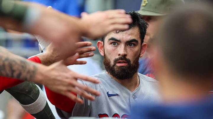 May 17, 2026; Cumberland, Georgia, USA; Boston Red Sox catcher Connor Wong (12) celebrates scoring a run against the Atlanta Braves during the ninth inning at Truist Park. Mandatory Credit: Jordan Godfree-Imagn Images