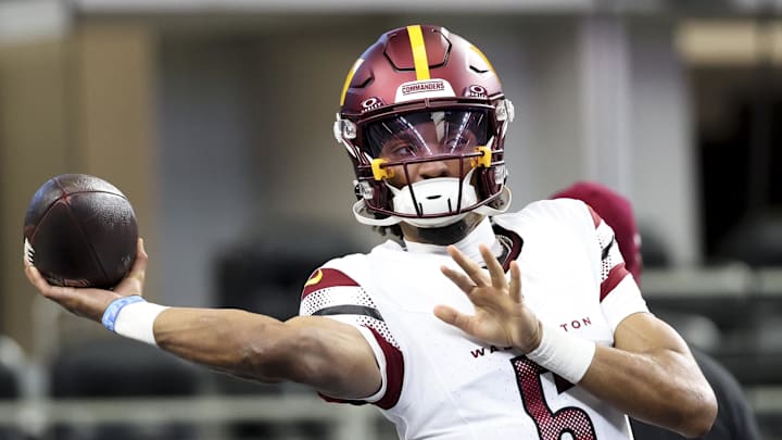Jan 5, 2025; Arlington, Texas, USA; Washington Commanders quarterback Jayden Daniels (5) warms up before the game against the Dallas Cowboys at AT&T Stadium. Mandatory Credit: Kevin Jairaj-Imagn Images Jan 5, 2025; Arlington, Texas, USA; Washington Commanders quarterback Jayden Daniels (5) warms up before the game against the Dallas Cowboys at AT&T Stadium. Mandatory Credit: Kevin Jairaj-Imagn Images