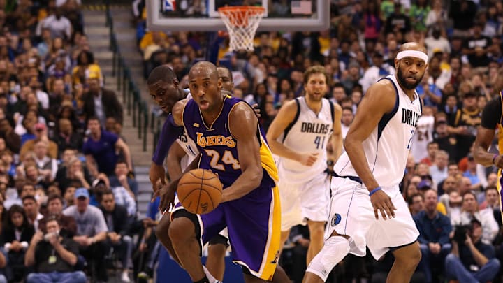 Feb 24, 2013; Dallas, TX, USA; Los Angeles Lakers guard Kobe Bryant (24) drives against the Dallas Mavericks at the American Airlines Center. The Lakers beat the Mavs 103-99. Mandatory Credit: Matthew Emmons-Imagn Images Feb 24, 2013; Dallas, TX, USA; Los Angeles Lakers guard Kobe Bryant (24) drives against the Dallas Mavericks at the American Airlines Center. The Lakers beat the Mavs 103-99. Mandatory Credit: Matthew Emmons-Imagn Images