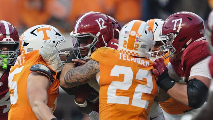 Oct 17, 2026; Knoxville, Tennessee, USA; Tennessee Volunteers linebacker Jeremiah Telander (22) sacks Alabama Crimson Tide quarterback Keelon Russell (12) during the second half at Neyland Stadium. Mandatory Credit: Randy Sartin-Imagn Images Oct 17, 2026; Knoxville, Tennessee, USA; Tennessee Volunteers linebacker Jeremiah Telander (22) sacks Alabama Crimson Tide quarterback Keelon Russell (12) during the second half at Neyland Stadium. Mandatory Credit: Randy Sartin-Imagn Images