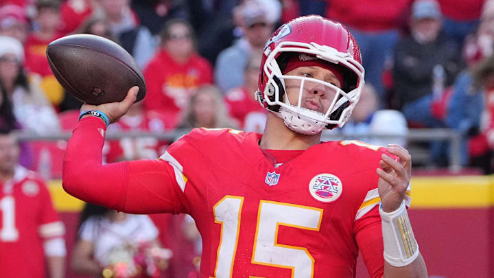 Nov 23, 2025; Kansas City, Missouri, USA; Kansas City Chiefs quarterback Patrick Mahomes (15) throws a pass against the Indianapolis Colts in the second half at GEHA Field at Arrowhead Stadium. Mandatory Credit: Denny Medley-Imagn Images