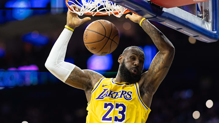 Nov 27, 2023; Philadelphia, Pennsylvania, USA; Los Angeles Lakers forward LeBron James (23) dunks the ball against the Philadelphia 76ers during the second quarter at Wells Fargo Center. Mandatory Credit: Bill Streicher-Imagn Images