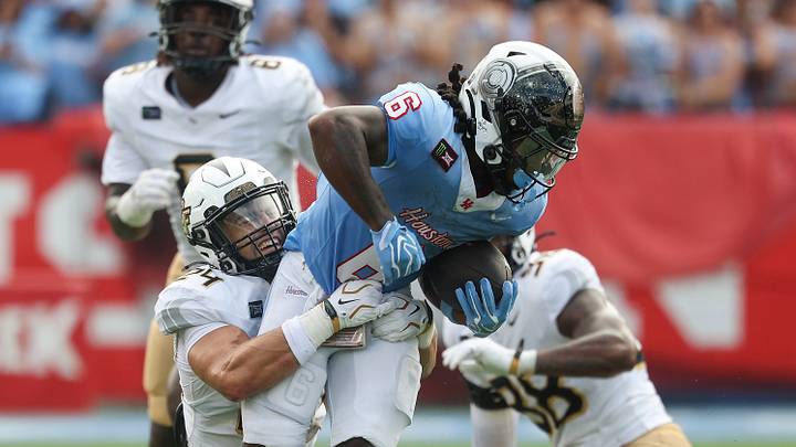 Oct 3, 2026; Houston, Texas, USA; Houston Cougars running back Re'shaun Sanford II (6) runs with the ball as UCF Knights linebacker Tackett Curtis (24) attempts to make a tackle during the first quarter at TDECU Stadium. Mandatory Credit: Troy Taormina-Imagn Images Oct 3, 2026; Houston, Texas, USA; Houston Cougars running back Re'shaun Sanford II (6) runs with the ball as UCF Knights linebacker Tackett Curtis (24) attempts to make a tackle during the first quarter at TDECU Stadium. Mandatory Credit: Troy Taormina-Imagn Images