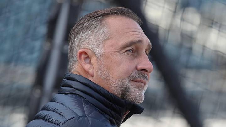 Apr 7, 2025; Pittsburgh, Pennsylvania, USA;  St. Louis Cardinals President of Baseball Operations John Mozeliak looks on at the batting cage before the game against the Pittsburgh Pirates at PNC Park. Mandatory Credit: Charles LeClaire-Imagn Images