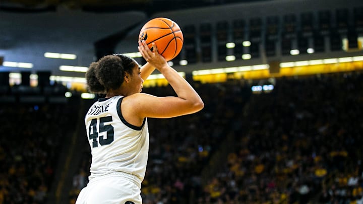 Iowa forward Hannah Stuelke (45) shoots the ball during a NCAA Big Ten Conference women's basketball game against Indiana, Sunday, Feb. 26, 2023, at Carver-Hawkeye Arena in Iowa City, Iowa. Iowa forward Hannah Stuelke (45) shoots the ball during a NCAA Big Ten Conference women's basketball game against Indiana, Sunday, Feb. 26, 2023, at Carver-Hawkeye Arena in Iowa City, Iowa.