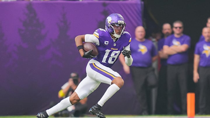 Sep 21, 2025; Minneapolis, Minnesota, USA; Minnesota Vikings wide receiver Justin Jefferson (18) runs after the catch during the first half against the Cincinnati Bengals at U.S. Bank Stadium. Mandatory Credit: Brad Rempel-Imagn Images