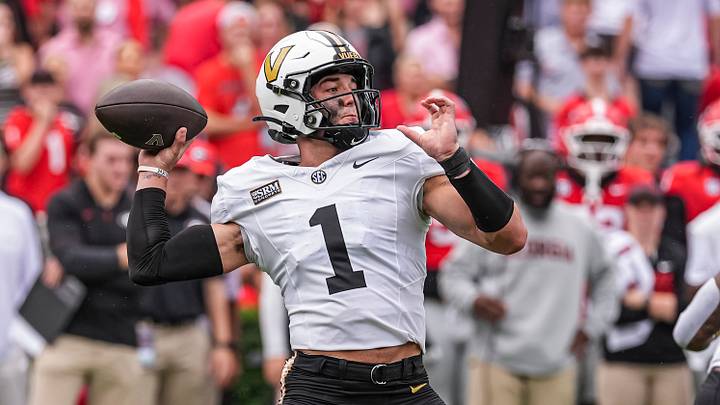 Oct 3, 2026; Athens, Georgia, USA; Vanderbilt Commodores quarterback Blaze Berlowitz (1) passes against the Georgia Bulldogs during the first quarter at Sanford Stadium. Mandatory Credit: Dale Zanine-Imagn Images Oct 3, 2026; Athens, Georgia, USA; Vanderbilt Commodores quarterback Blaze Berlowitz (1) passes against the Georgia Bulldogs during the first quarter at Sanford Stadium. Mandatory Credit: Dale Zanine-Imagn Images