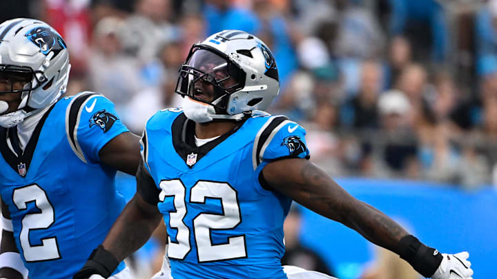 Aug 8, 2025; Charlotte, North Carolina, USA; Carolina Panthers linebacker Trevin Wallace (32) reacts in the first quarter at Bank of America Stadium. Mandatory Credit: Bob Donnan-Imagn Images