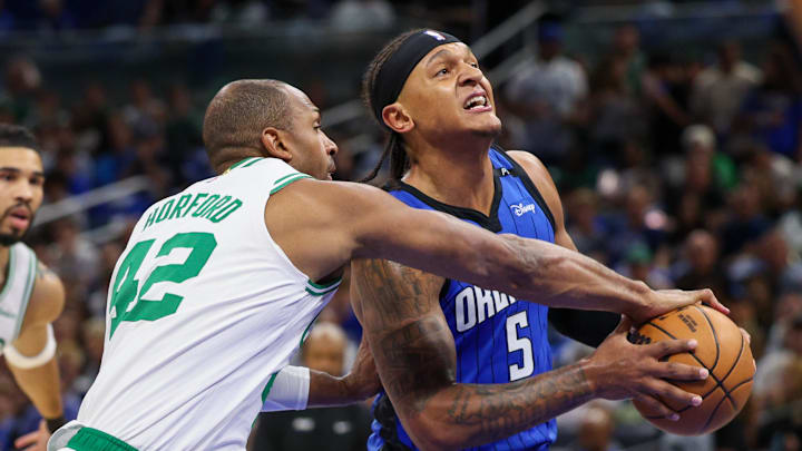 Apr 27, 2025; Orlando, Florida, USA; Orlando Magic forward Paolo Banchero (5) is fouled by Boston Celtics center Al Horford (42) in the first quarter during game four of first round for the 2025 NBA Playoffs at Kia Center. Mandatory Credit: Nathan Ray Seebeck-Imagn Images Apr 27, 2025; Orlando, Florida, USA; Orlando Magic forward Paolo Banchero (5) is fouled by Boston Celtics center Al Horford (42) in the first quarter during game four of first round for the 2025 NBA Playoffs at Kia Center. Mandatory Credit: Nathan Ray Seebeck-Imagn Images