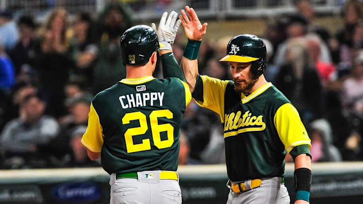 Aug 24, 2018; Minneapolis, MN, USA; Oakland Athletics third baseman Matt Chapman (26) reacts with catcher Jonathan Lucroy (21) after hitting a three run home run during the eighth inning against the Minnesota Twins at Target Field. Mandatory Credit: Jeffrey Becker-Imagn Images Aug 24, 2018; Minneapolis, MN, USA; Oakland Athletics third baseman Matt Chapman (26) reacts with catcher Jonathan Lucroy (21) after hitting a three run home run during the eighth inning against the Minnesota Twins at Target Field. Mandatory Credit: Jeffrey Becker-Imagn Images