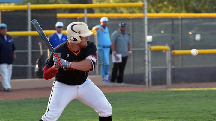 Centennials Brent Rigtrup watches a high fastball coming towards him during the first game of this year's New Mexico High School All-Star games held this weekend at Field of Dreams. 