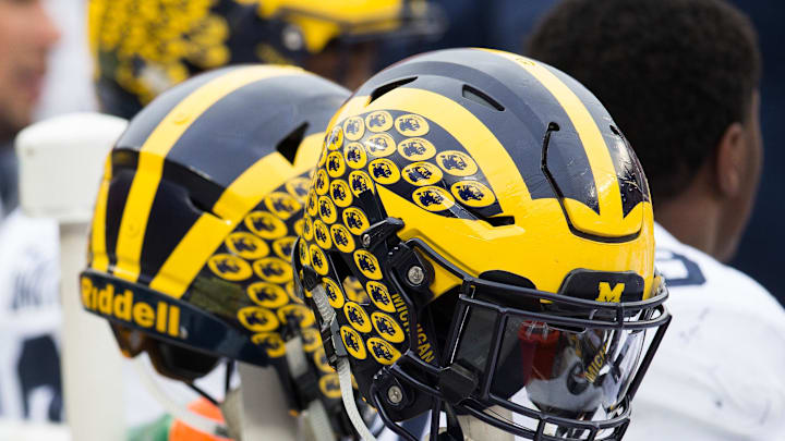 Nov 26, 2016; Columbus, OH, USA; A general view of Michigan Wolverines helmets on the sideline during the  game against the Ohio State Buckeyes at Ohio Stadium. Ohio State won the game 30-27 in double overtime. Mandatory Credit: Greg Bartram-Imagn Images
