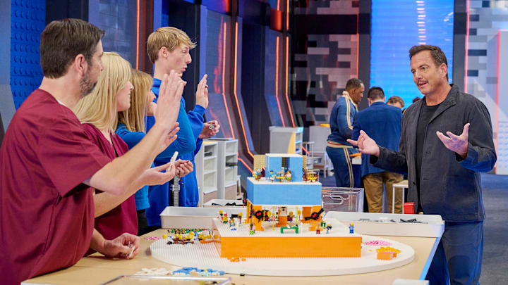 LEGO MASTERS: L-R: Contestants Jamie, Maia, Anne and Luke with Host Will Arnett in the LEGO MASTERS episode "Wedding Cakes" airing Monday, May 26 (8:00-9:02 PM ET/PT) on FOX. CR: Tom Griscom/FOX. ©2025 FOX MEDIA LLC.