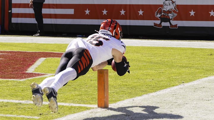 Oct 20, 2024; Cleveland, Ohio, USA; Cincinnati Bengals wide receiver Charlie Jones (15) returns the opening kickoff for a touchdown against the Cleveland Browns during the first quarter at Huntington Bank Field. Mandatory Credit: Scott Galvin-Imagn Images