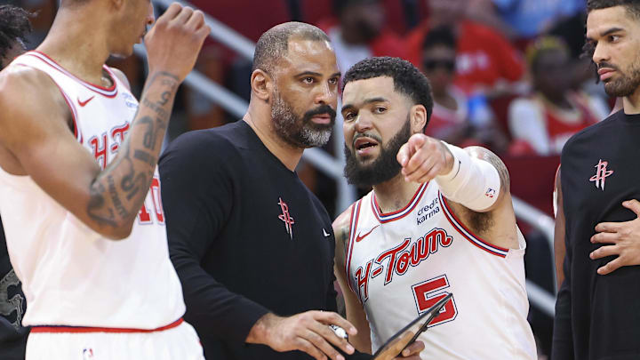Feb 25, 2024; Houston, Texas, USA; Houston Rockets head coach Ime Udoka talks with guard Fred VanVleet (5) during the second quarter against the Oklahoma City Thunder at Toyota Center. Mandatory Credit: Troy Taormina-Imagn Images