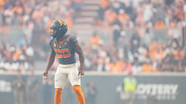 Tennessee defensive back Tevis Metcalf (20) on the field with firework smoke, during a game between Tennessee and Auburn in Neyland Stadium in Knoxville, Tennessee, Oct. 3, 2026. Tennessee defensive back Tevis Metcalf (20) on the field with firework smoke, during a game between Tennessee and Auburn in Neyland Stadium in Knoxville, Tennessee, Oct. 3, 2026.