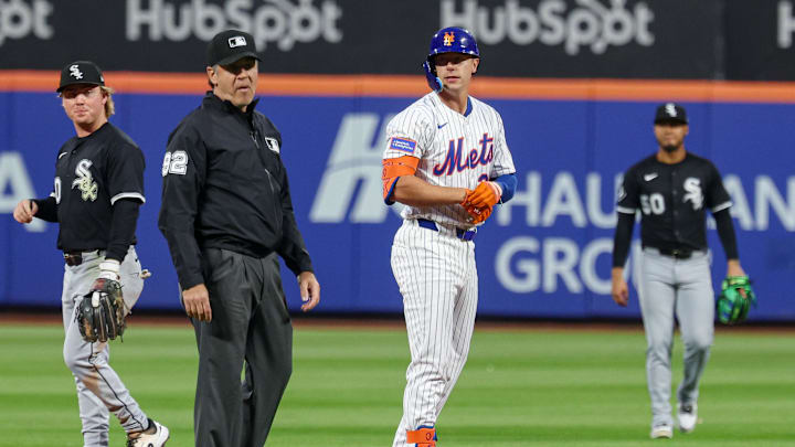 May 27, 2025; New York City, New York, USA; New York Mets first baseman Jared Young (29) on second base after hitting a double during the third inning against the Chicago White Sox at Citi Field. Mandatory Credit: Vincent Carchietta-Imagn Images
