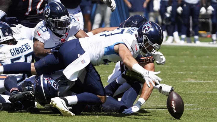 Aug 12, 2023; Chicago, Illinois, USA; Tennessee Titans linebacker Ben Niemann (47) recovers a Chicago Bears fumble during the second quarter at Soldier Field. 
