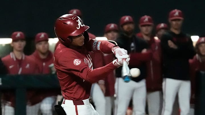 Mar 20, 2025; Tuscaloosa AL, USA; Alabama shortstop Justin Lebron (1) connects for a three-run double during the game with Tennessee at Sewell-Thomas Stadium.