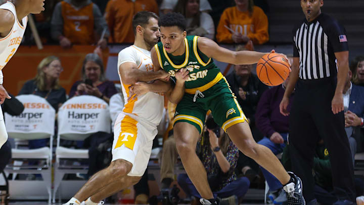Dec 5, 2023; Knoxville, Tennessee, USA; Tennessee Volunteers guard Santiago Vescovi (25) defends