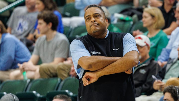 Jan 30, 2025; New Orleans, Louisiana, USA;  Tulane Green Wave head coach Ron Hunter reacts to a play against the Memphis Tigers during the first half at Avron B. Fogelman Arena in Devlin Fieldhouse. Mandatory Credit: Stephen Lew-Imagn Images