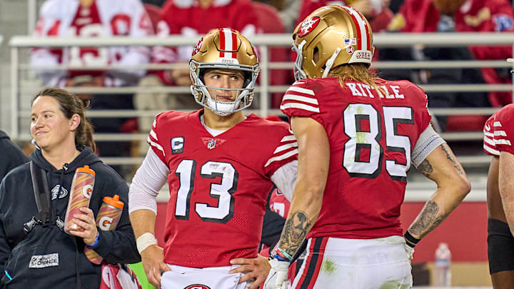 San Francisco 49ers quarterback Brock Purdy (13) and tight end George Kittle (85)
