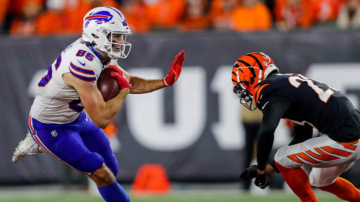 Nov 5, 2023; Cincinnati, Ohio, USA; Buffalo Bills tight end Dalton Kincaid (86) runs with the ball against Cincinnati Bengals safety Dax Hill (23) in the second half at Paycor Stadium. Nov 5, 2023; Cincinnati, Ohio, USA; Buffalo Bills tight end Dalton Kincaid (86) runs with the ball against Cincinnati Bengals safety Dax Hill (23) in the second half at Paycor Stadium.