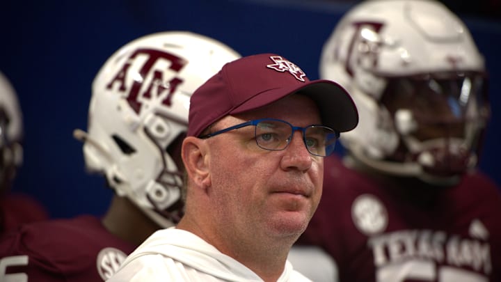 Sep 28, 2024; Arlington, Texas, USA; Texas A&M Aggies coach Mike Elko looks on at the field prior to a game against the Arkansas Razorbacks at AT&T Stadium. 