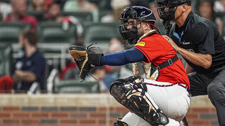 May 15, 2026; Cumberland, Georgia, USA; Atlanta Braves catcher Sandy Leon (9) catches against the Boston Red Sox during the seventh inning at Truist Park. Mandatory Credit: Dale Zanine-Imagn Images May 15, 2026; Cumberland, Georgia, USA; Atlanta Braves catcher Sandy Leon (9) catches against the Boston Red Sox during the seventh inning at Truist Park. Mandatory Credit: Dale Zanine-Imagn Images