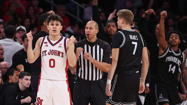 Jan 3, 2026; New York, New York, USA;  St. John's basketball guard Dylan Darling (0) reacts after getting called for a foul on Providence Friars guard Stefan Vaaks (7) in the second half at Madison Square Garden. 