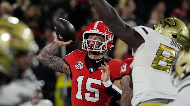 Georgia quarterback Carson Beck (15) throws the ball during the first half of a NCAA college football game against Georgia Tech in Athens, Ga., on Friday, Nov. 29, 2024.