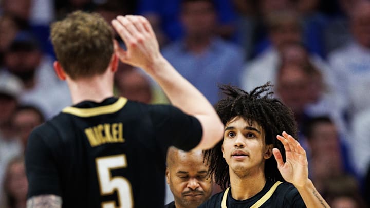 Feb 28, 2026; Lexington, Kentucky, USA; Vanderbilt Commodores guard Tyler Tanner (3) fives forward Tyler Nickel (5) during the second half against the Kentucky Wildcats at Rupp Arena at Central Bank Center. Mandatory Credit: Jordan Prather-Imagn Images