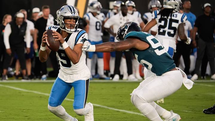 Jacksonville Jaguars defensive end B.J. Green II (95) pressures Carolina Panthers quarterback Bryce Young Jacksonville Jaguars defensive end B.J. Green II (95) pressures Carolina Panthers quarterback Bryce Young